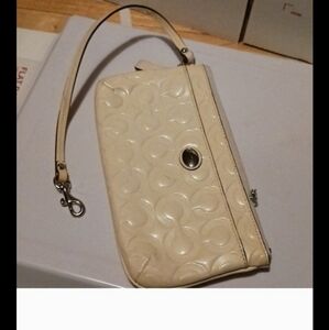 Coach signature zip wristlet